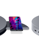A close-up of the Lenovo Go Desk Station lamp's base, photographed against a white background, showing the pop-out wireless charging pad and various USB and HDMI ports.